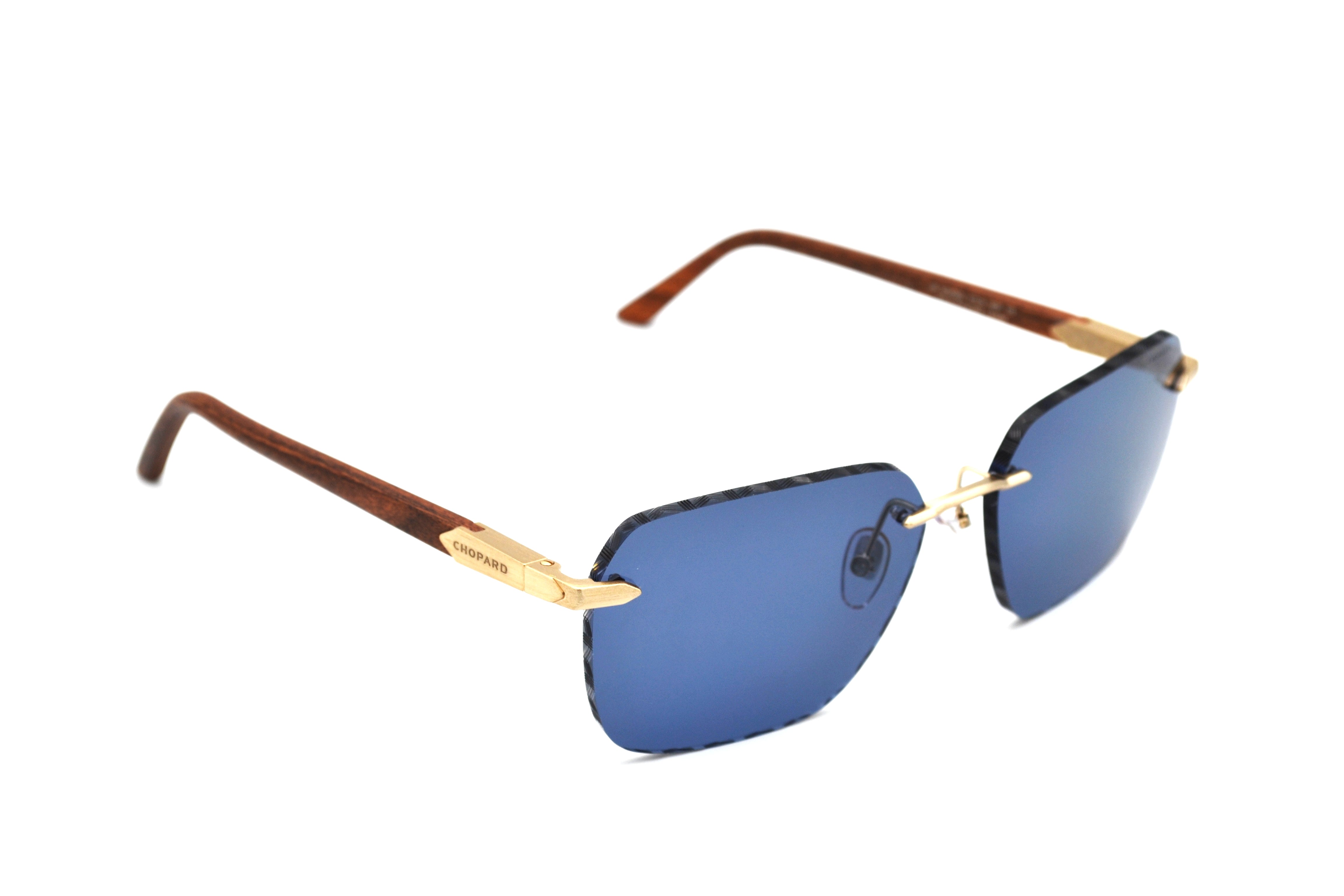 Gafas de sol Chopard SCHG62V 383P Diseño rectangular de madera y metal, lentes azules