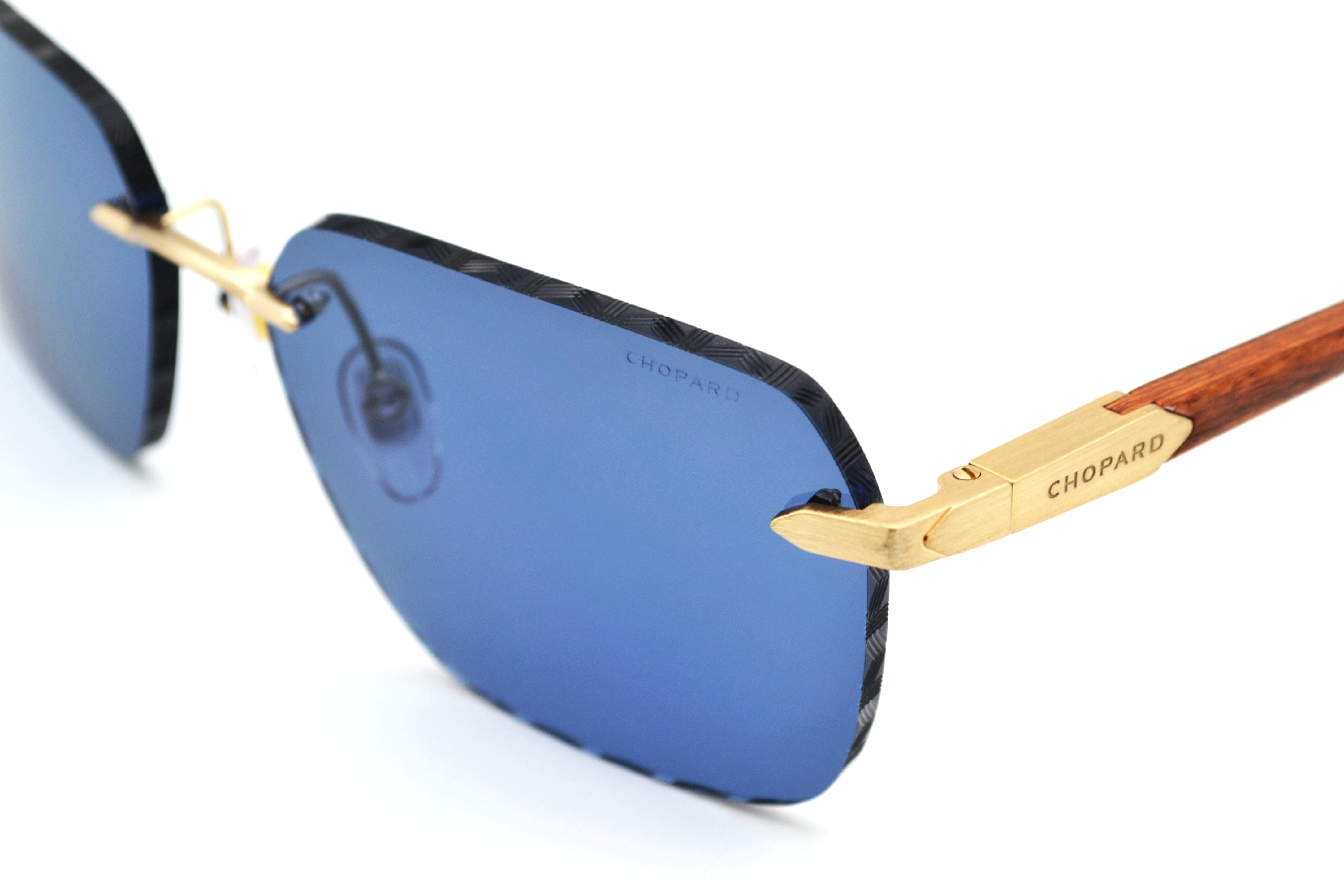 Gafas de sol Chopard SCHG62V 383P Diseño rectangular de madera y metal, lentes azules