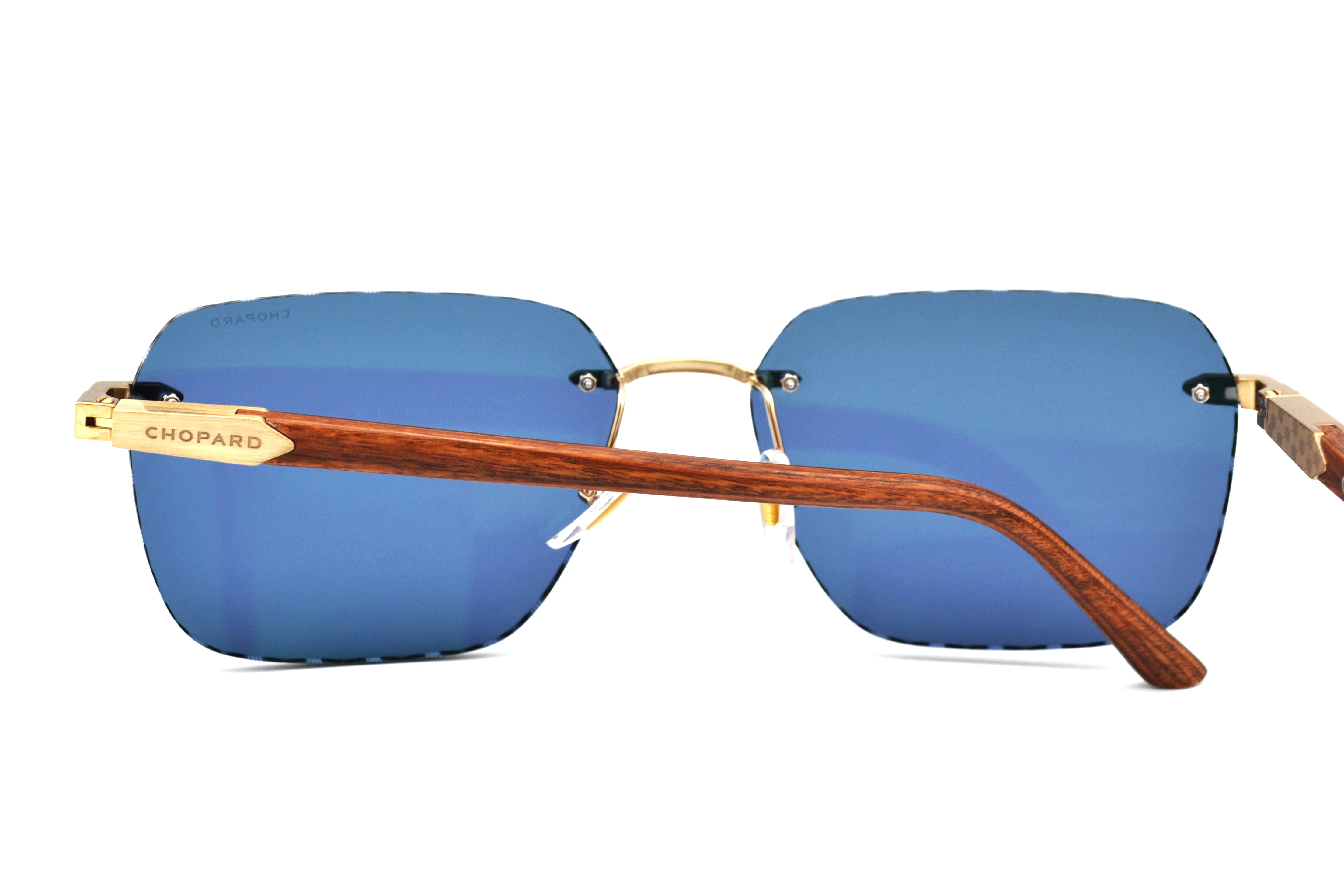 Gafas de sol Chopard SCHG62V 383P Diseño rectangular de madera y metal, lentes azules