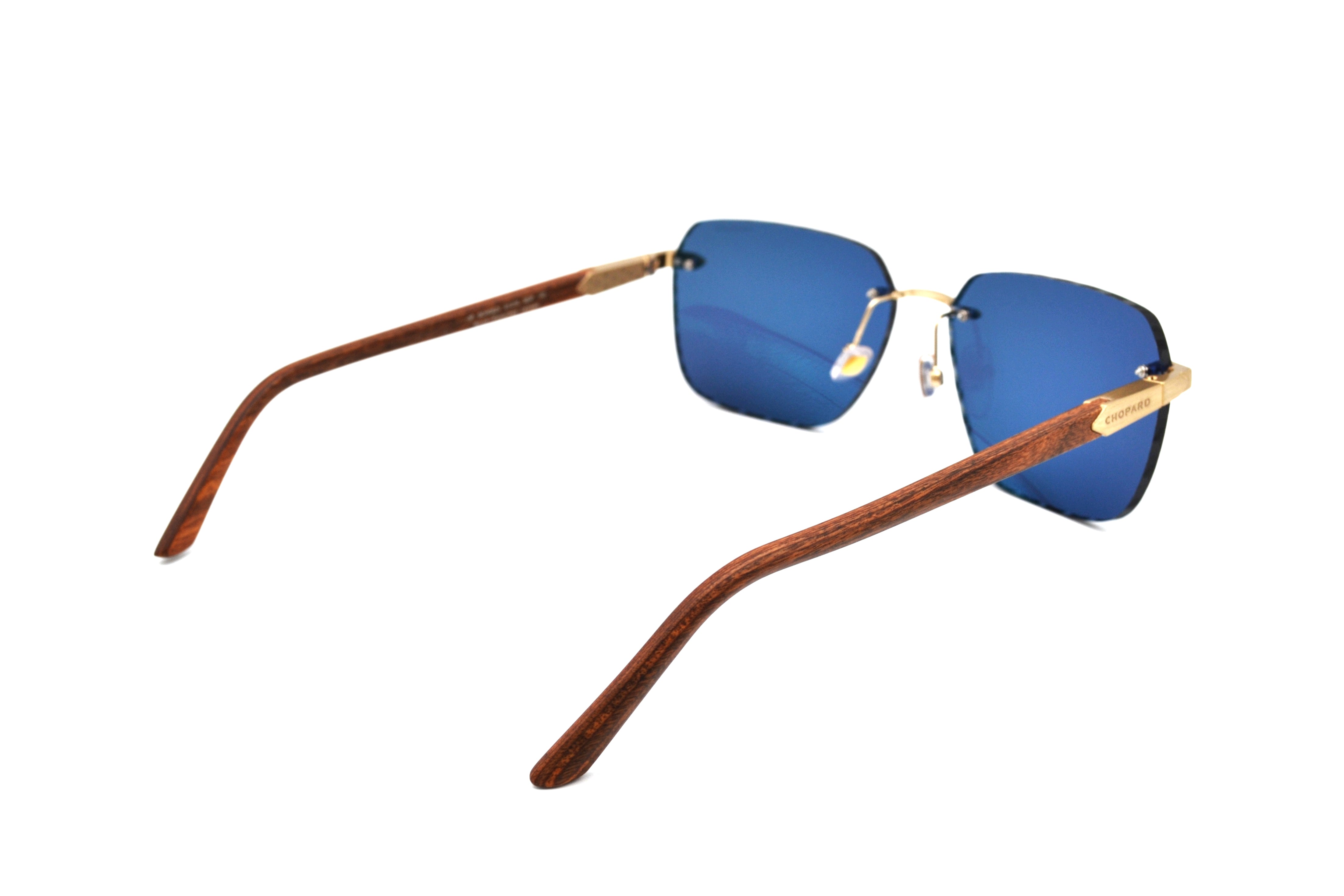 Gafas de sol Chopard SCHG62V 383P Diseño rectangular de madera y metal, lentes azules