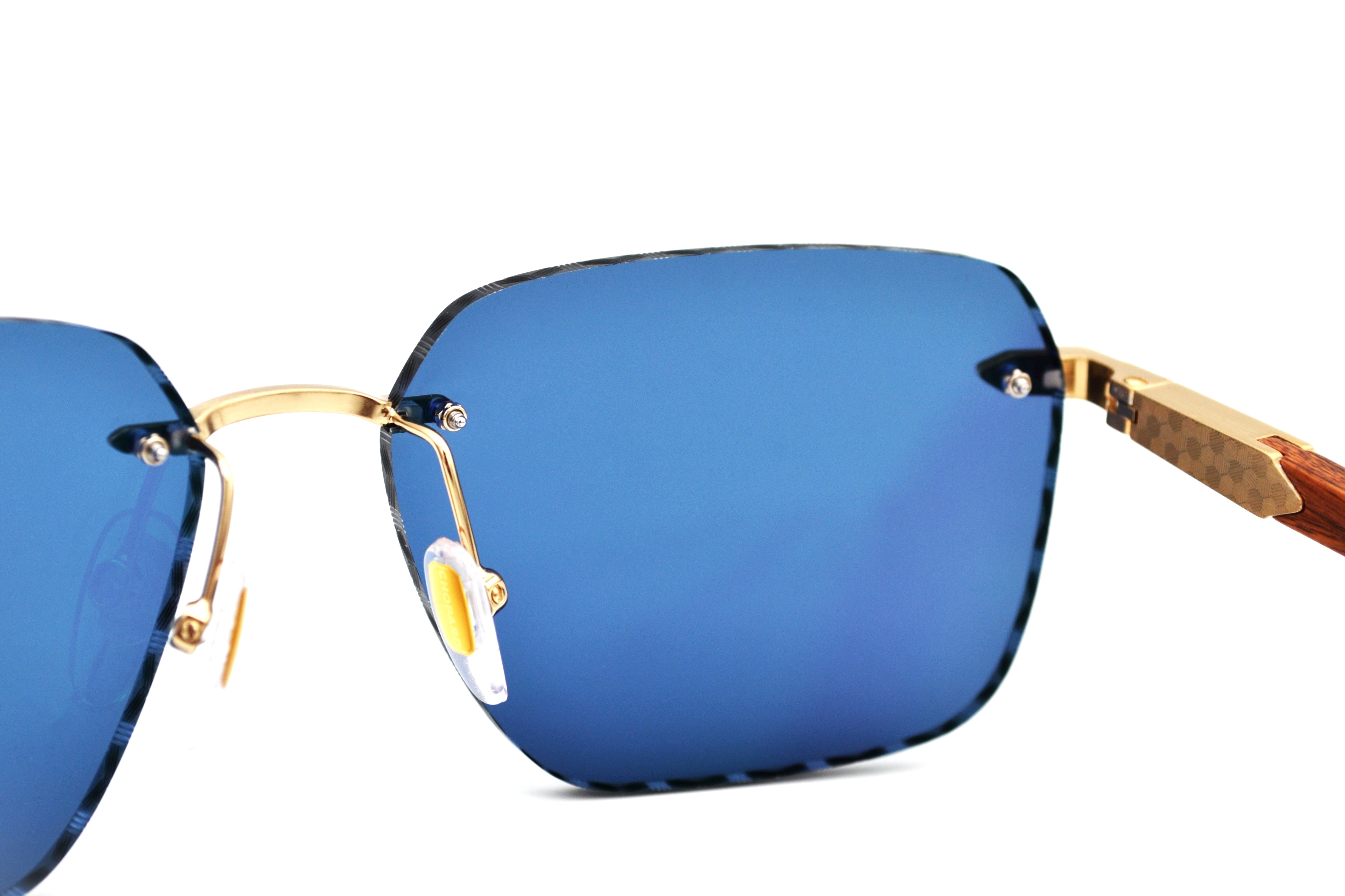 Gafas de sol Chopard SCHG62V 383P Diseño rectangular de madera y metal, lentes azules