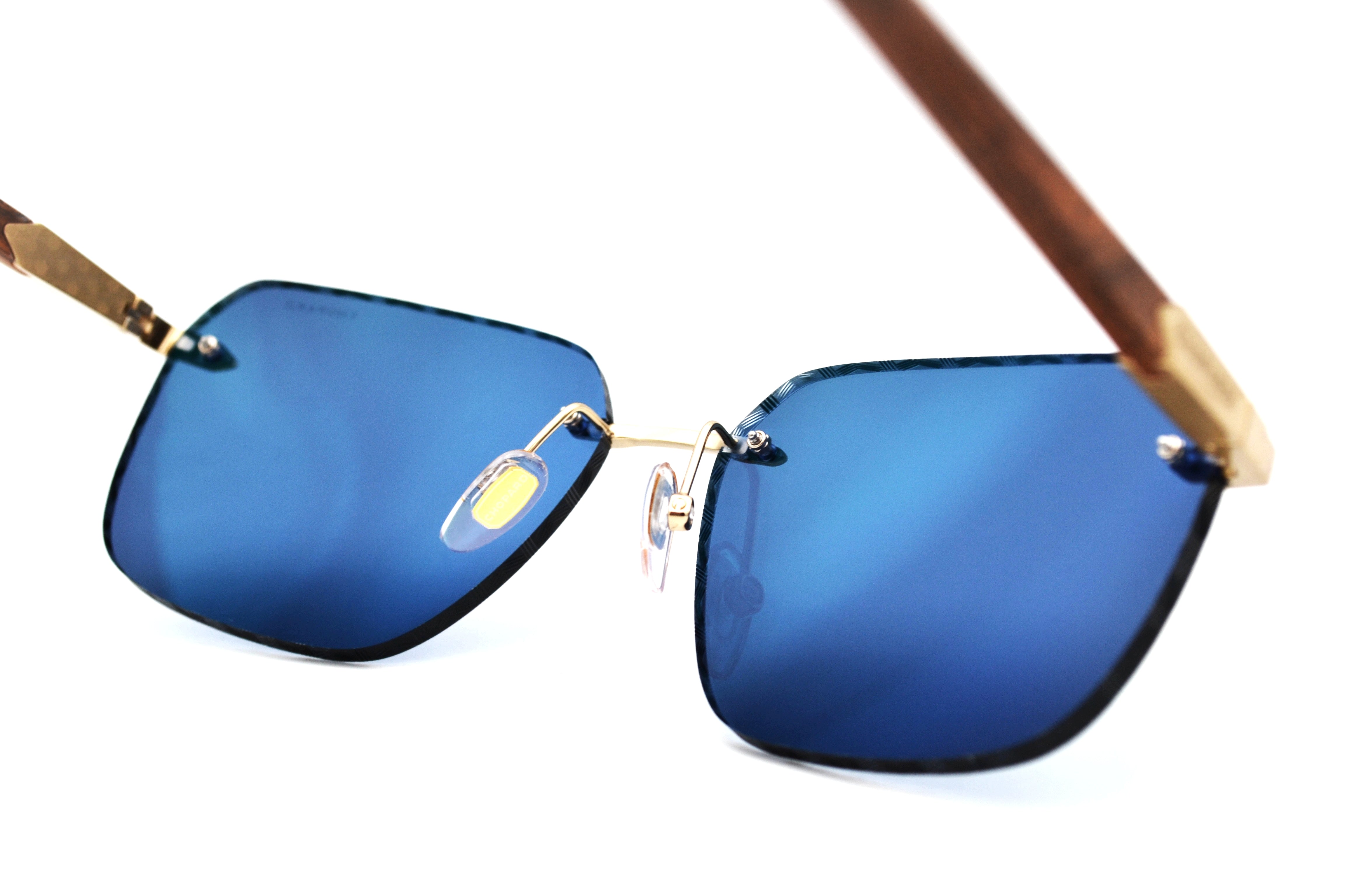 Gafas de sol Chopard SCHG62V 383P Diseño rectangular de madera y metal, lentes azules