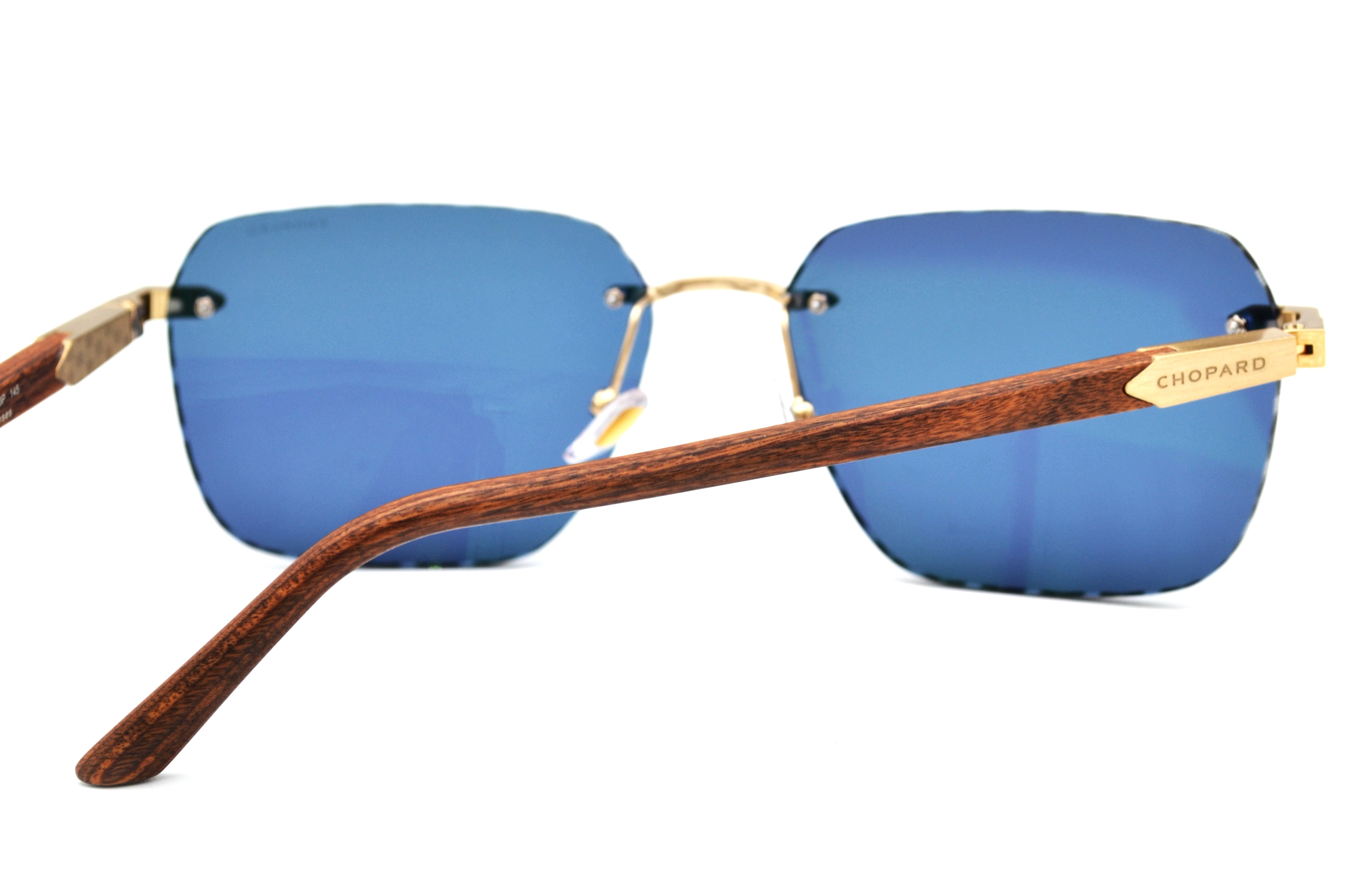Gafas de sol Chopard SCHG62V 383P Diseño rectangular de madera y metal, lentes azules