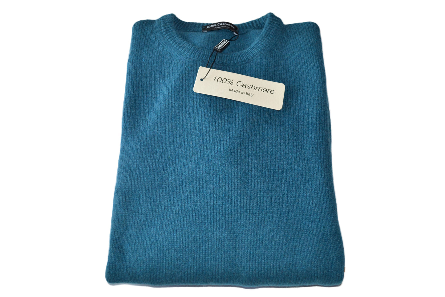 100% cashmere sweater, Made in Italy with round neck, petrol color