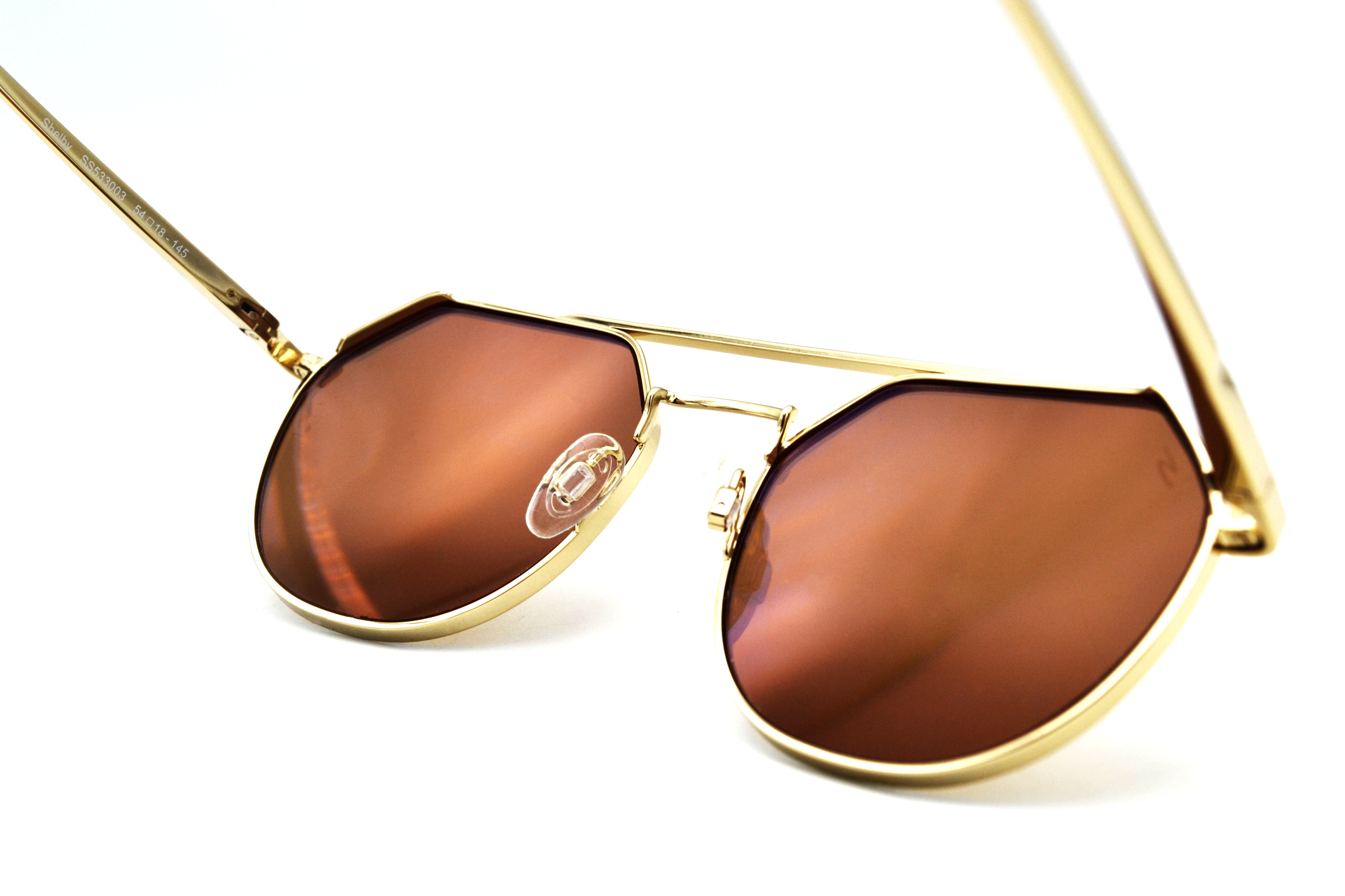 Gafas de sol Serengeti SHELBY SS533003 Diseño de metal dorado, unisex