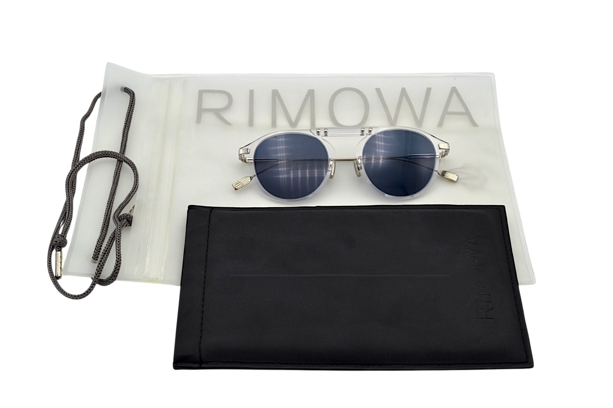Gafas de sol RIMOWA RW40005U - Diseño redondo de metacrilato transparente, para hombre