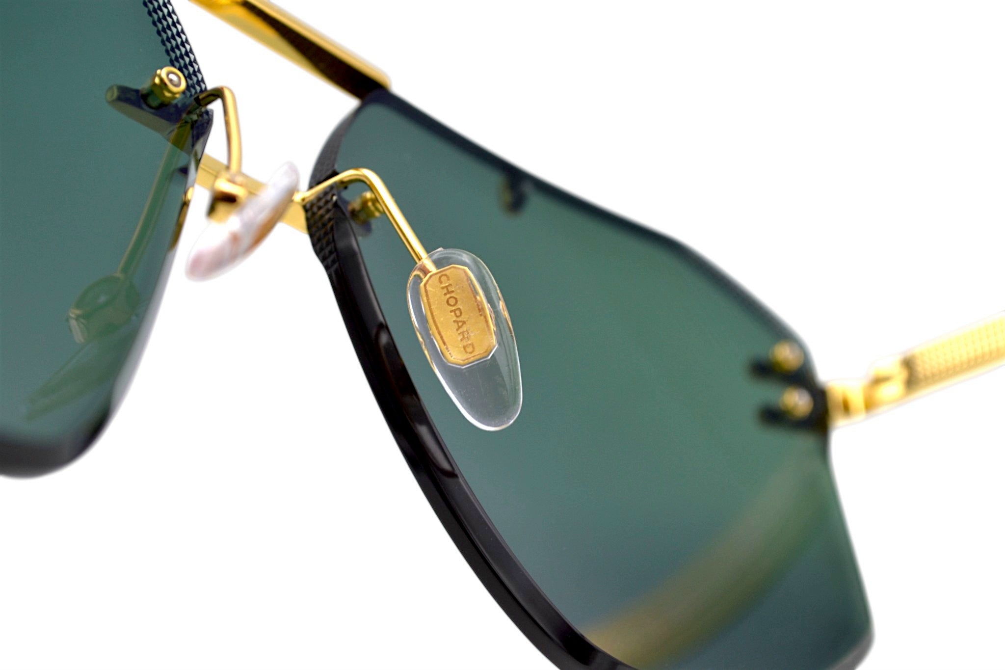 Gafas de sol Chopard SCHL23 0400 Diseño rectangular rimless para hombre